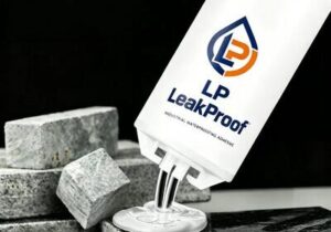 Non-staining weather-resistant sealant applied to aluminum and natural stone facade cladding expansion joints