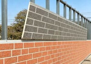 Flexible elastomeric sealant bridging expansion gaps between EIFS exterior insulation wall panels