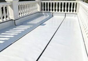 Single-ply TPO PVC waterproof membrane sheet lap seams and parapet terminations sealed with joint adhesive