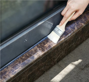 Application of clear waterproof sealant on interior tile joints and wet area substrates for invisible moisture protection